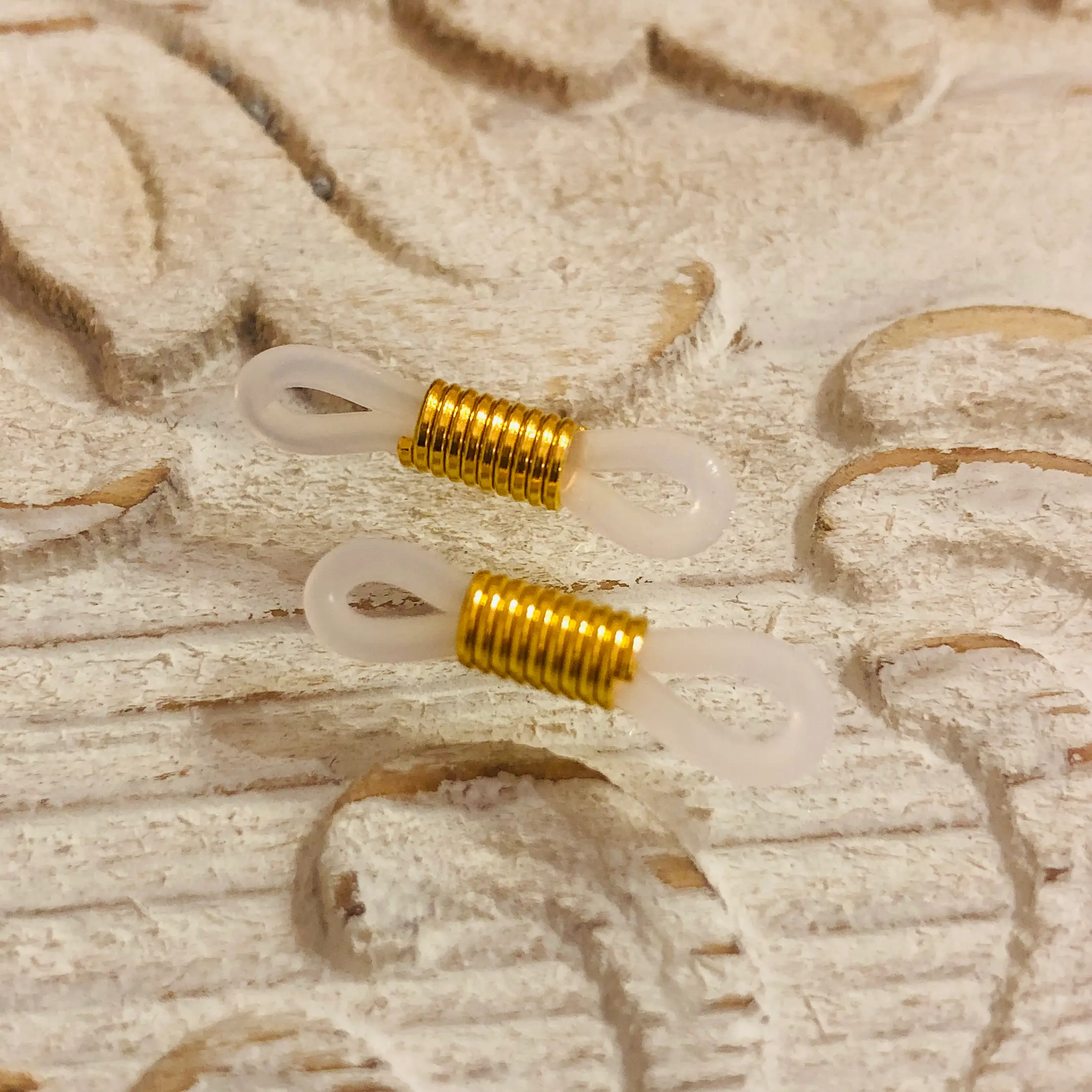 2 Stk. DQ Brillen Schlaufen Transparent-gold