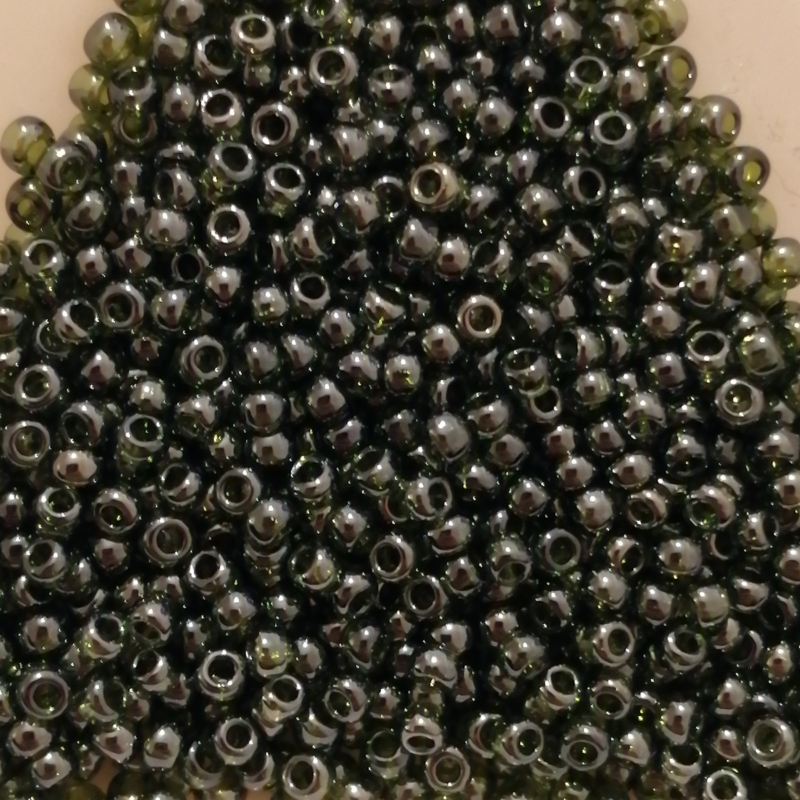 Toho 11/0 - 2,2 mm Transp. Lustered Olivine
