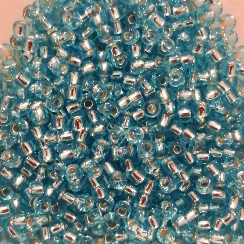 Toho 11/0 - 2,2 mm - 8g - Farbe: 23 Silver-Lined Aquamarine
