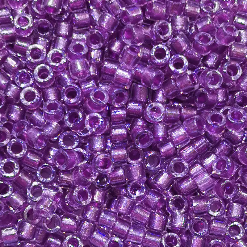 Miyuki Delica 11/0 - 1.6mm / 7g / DB906 Transparent Farbeinzug Tanzanite