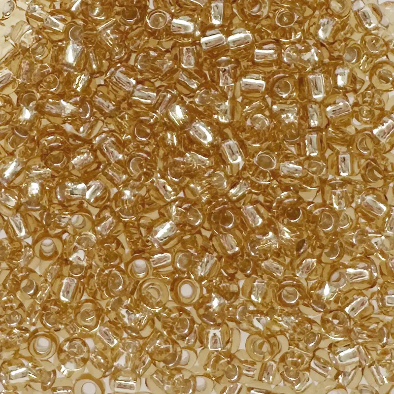 Toho 11/0 - 2,2 mm - 8g - Farbe: 22 Silver-Lined Light Topaz